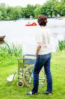 Woman with wheelchair in the park