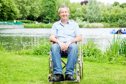 Man with wheelchair in the park