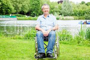 Man with wheelchair in the park