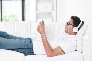 Indian guy enjoying music