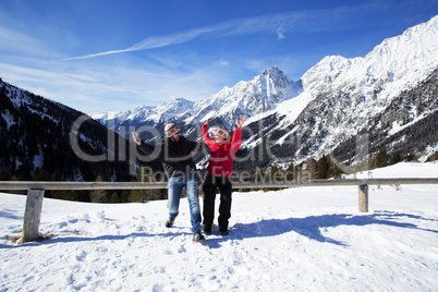 Happy couple in winter landscape