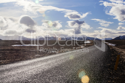 Snowy volcano landscape with dramatic clouds in Iceland