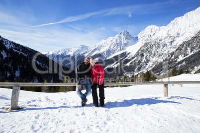 Happy couple in winter landscape