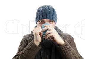 Attractive man with a cup of tea in his hands