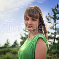 Portrait of a young sensual blonde outdoors