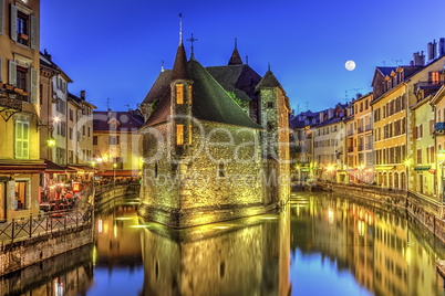 Palais de l'Ile jail and canal in Annecy old city, France, HDR