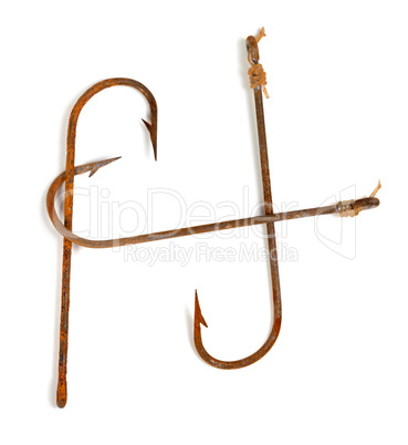 H-shaped old rusty fish hooks