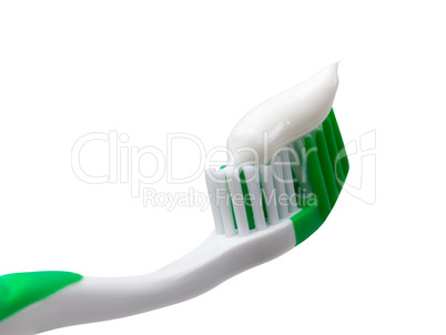 Green toothbrush with toothpaste