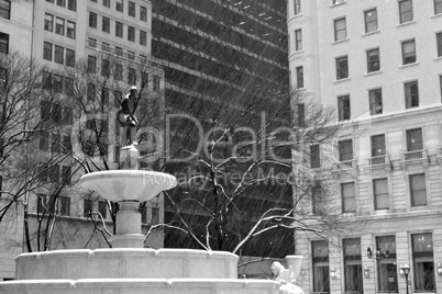 Pulitzer Fountain under the snow in black and white