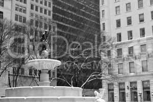 Pulitzer Fountain under the snow in black and white
