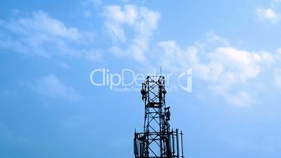 Cloudy sky with network tower