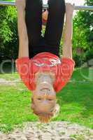 girl hanging upside down