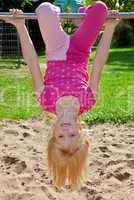 girl hanging upside down