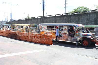 MANILA - MAY 17: colorful jeepneys known for their crowded seati