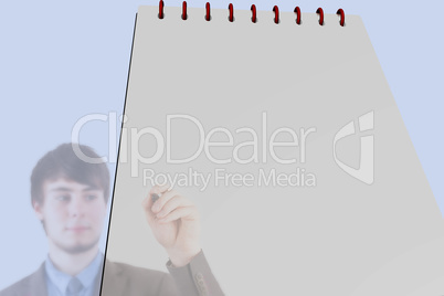 Writing pad with reflection of man