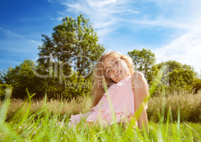 girl sitting on grass