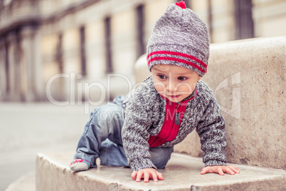 happy little baby boy wearing hat