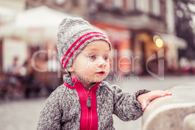 happy little baby boy wearing hat