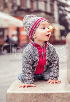 happy little baby boy wearing hat