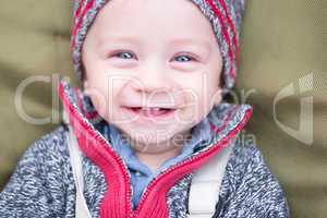 happy little baby boy wearing hat