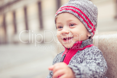 happy little baby boy wearing hat