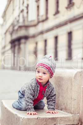 happy little baby boy wearing hat