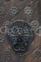 middle ages door bell on massive wooden door