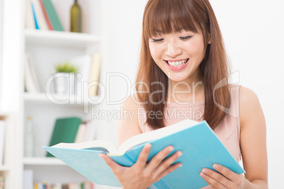 Asian girl reading