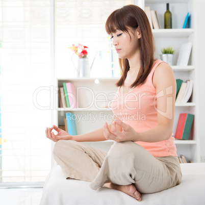 Asian girl meditating