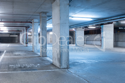 Dark parking garage industrial room interior.