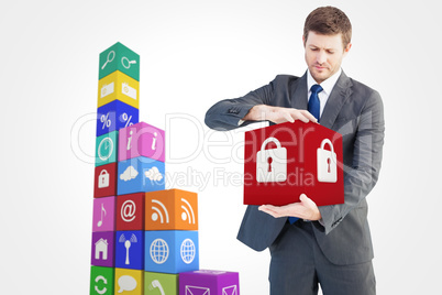 Composite image of businessman showing something with his hands