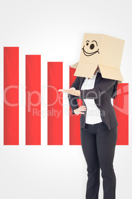Composite image of businesswoman presenting with box over head