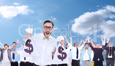 Composite image of geeky businessman holding money bags