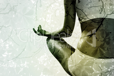 Composite image of fit woman sitting in lotus pose