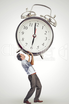 Composite image of businessman posing with arms raised