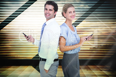 Composite image of business people using smartphone back to back