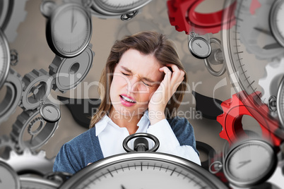 Composite image of woman with headache holding mug