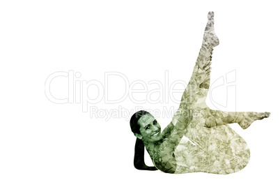 Composite image of fit woman stretching body in fitness studio