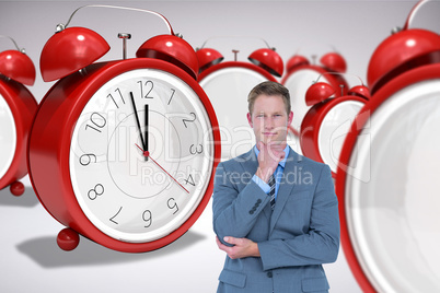 Composite image of thinking businessman