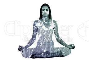 Composite image of toned woman in lotus pose at fitness studio