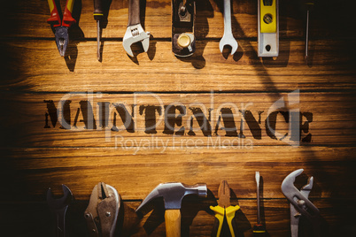 Maintenance  against desk with tools