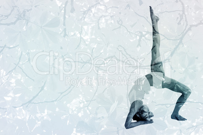 Composite image of sporty woman stretching body with raised leg
