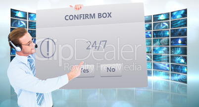 Composite image of businessman presenting card wearing headset