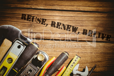 Reuse, renew, relive against tools on desk