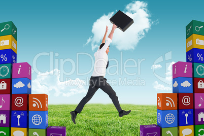 Composite image of businessman leaping with his briefcase