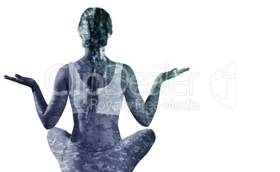 Composite image of sporty blonde sitting in lotus pose