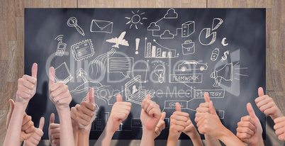 Composite image of group of hands giving thumbs up