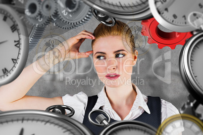 Composite image of thinking redhead businesswoman