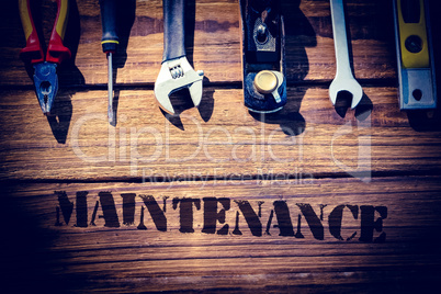 Maintenance  against desk with tools