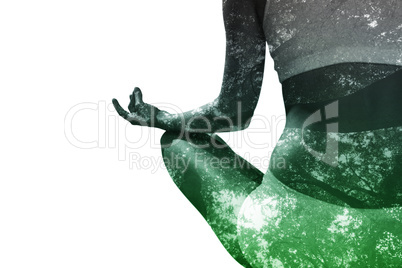 Composite image of fit woman sitting in lotus pose